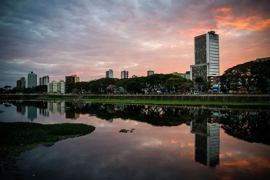river, water, reflection, sunset, dusk, buildings, city, sky HD wallpaper
