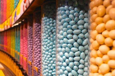 row of candies, candy, candy store, chocolate, m ms, sweet HD wallpaper