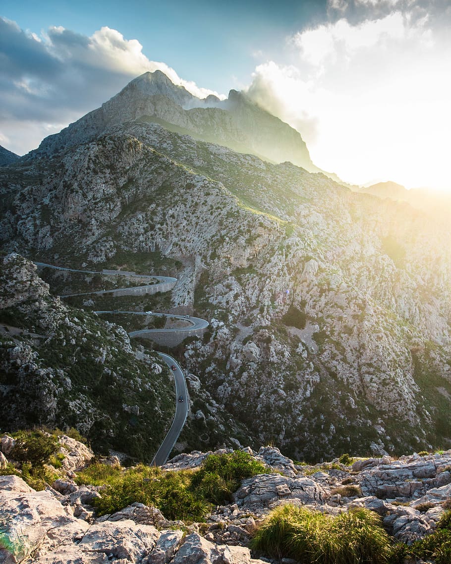gray asphalt road on white rocky mountain, ridge, sunlight HD wallpaper