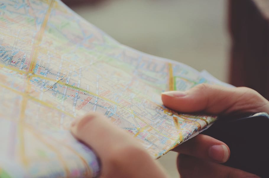 person holding map, navigation, hands, travel, route, journey HD wallpaper