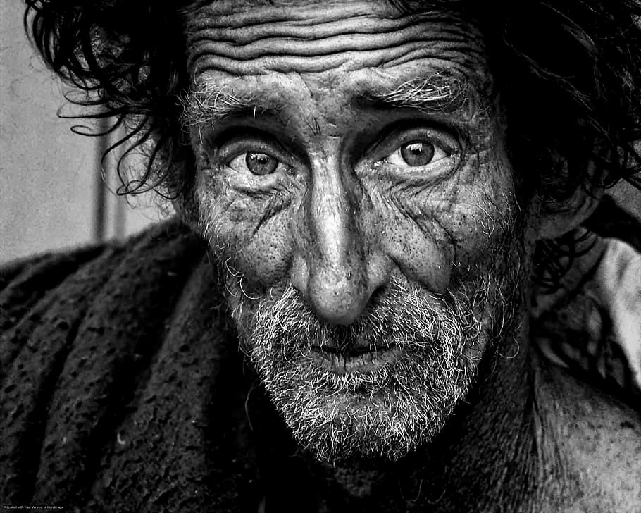 grayscale photo of man wearing fleece top, grey scale, homeless