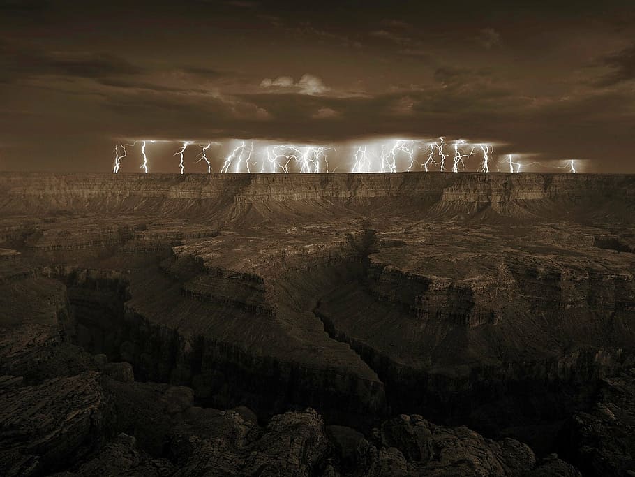 mountain under clouds and thunder, planet, brown, rays, landscape HD wallpaper