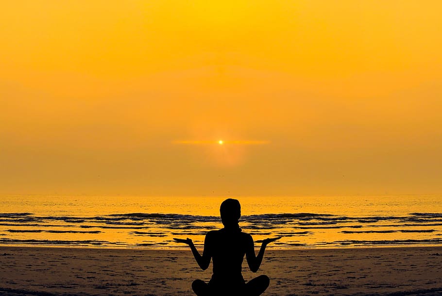 silhouette of woman meditating near body of water during sunset, HD wallpaper