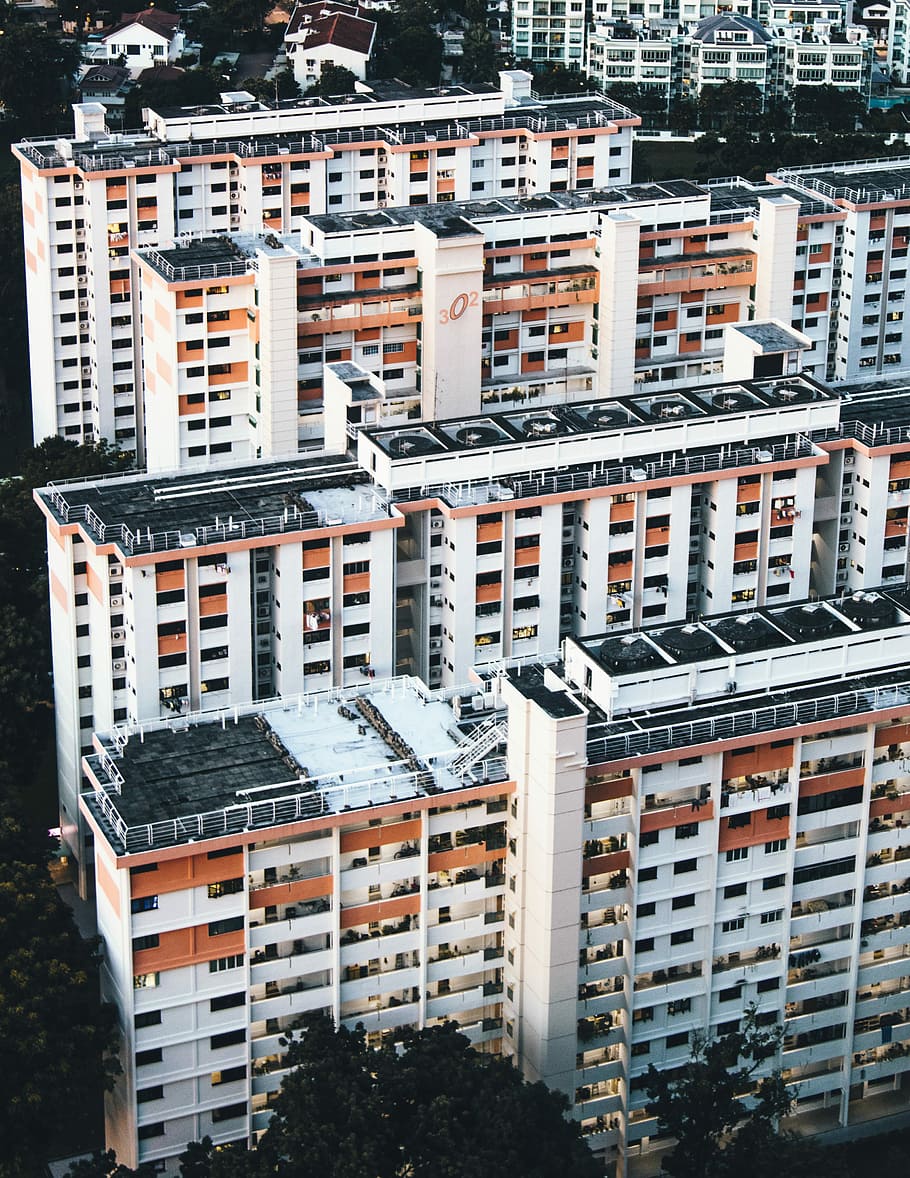 high angle photography of white and brown concrete building, aerial view of white high-rise buildings during daytime HD wallpaper