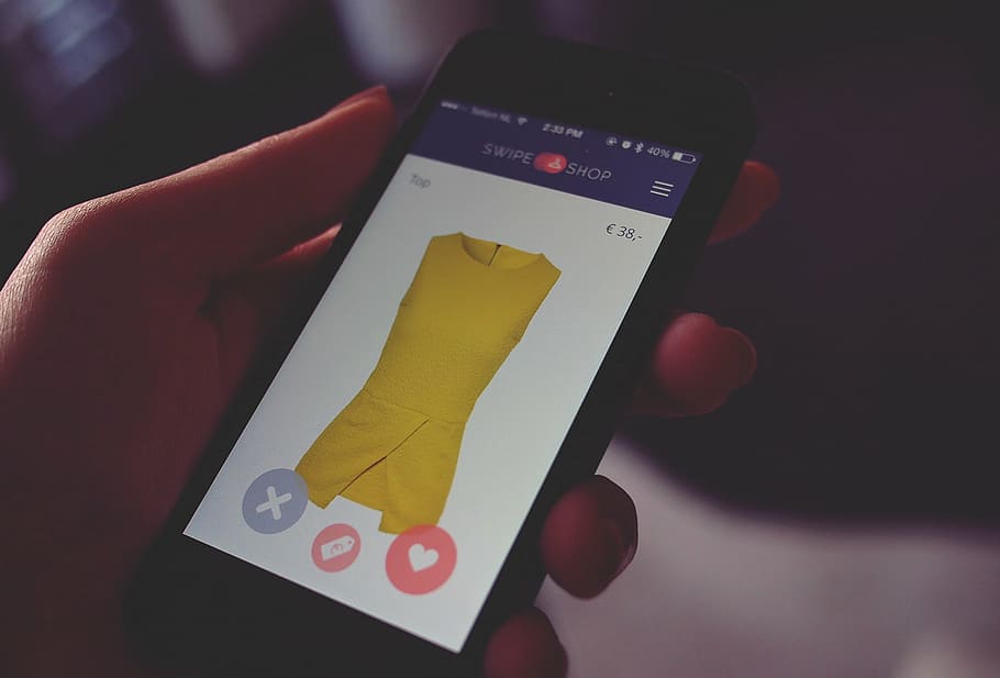 Android smartphone displaying yellow wrap minidress screengrab HD wallpaper
