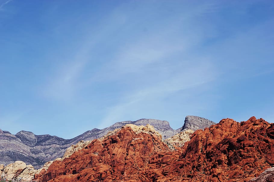 brown and beige mountain range, brown rock cliff photo during daytime HD wallpaper