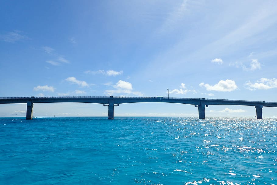 long gray concrete bridge surrounded by body of water, sea, bridge - Man Made Structure HD wallpaper