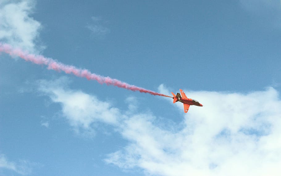 orange plane with pink smoke, jetplane, flying, white, clouds, HD wallpaper
