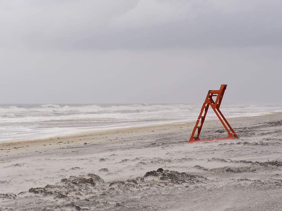 red metal ladder stand near seashore during daytime, red metal ladder beside seashore HD wallpaper