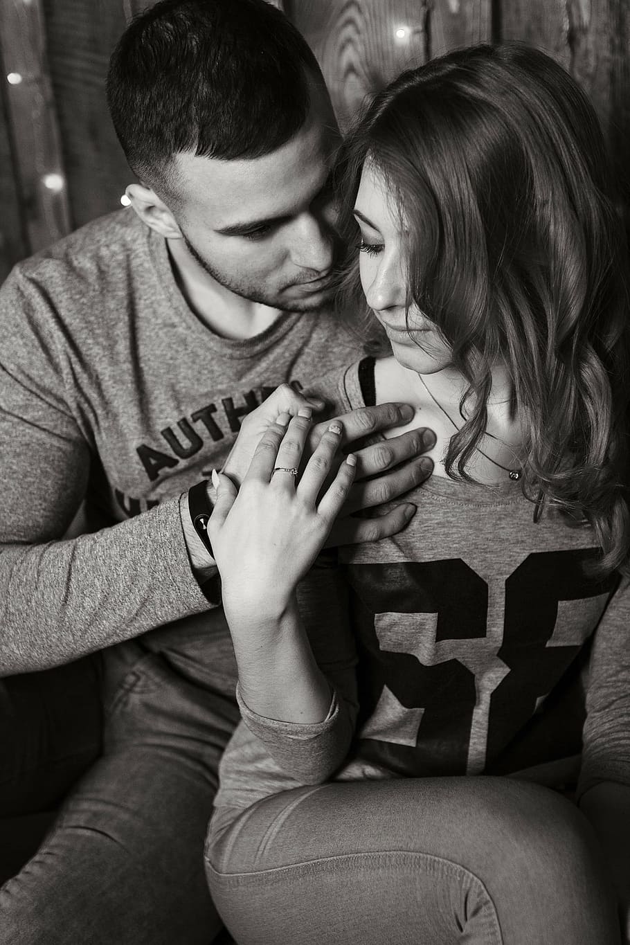 grayscale photo of man and woman in long-sleeved tops, love, lavstori