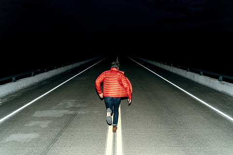 man running on road during night time, person running on gray road at nighttime HD wallpaper