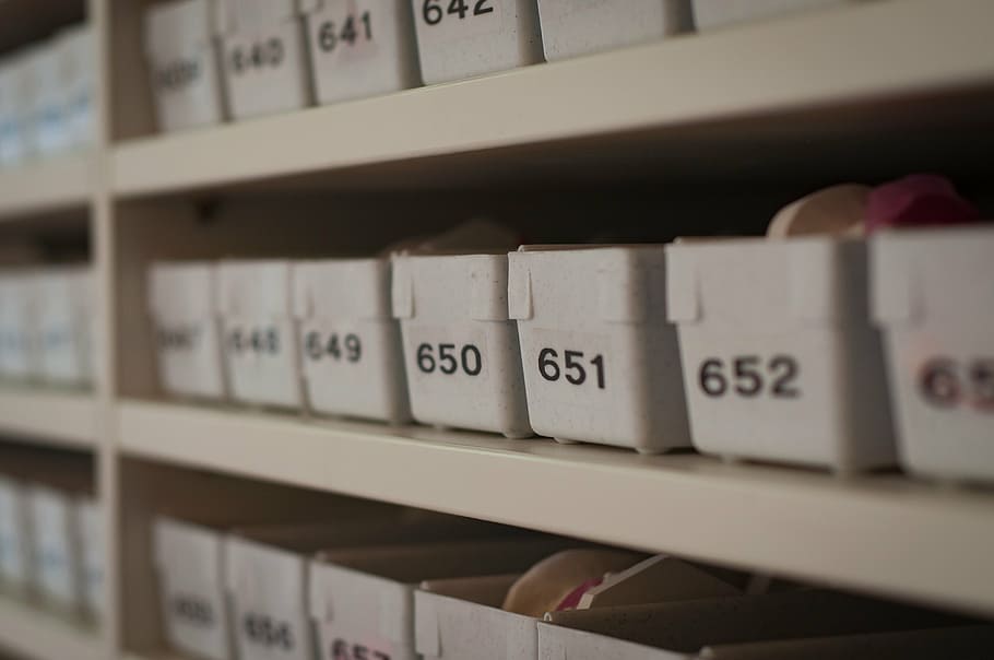 white plastic organizer bins, containers, numbers, labels, stacks HD wallpaper