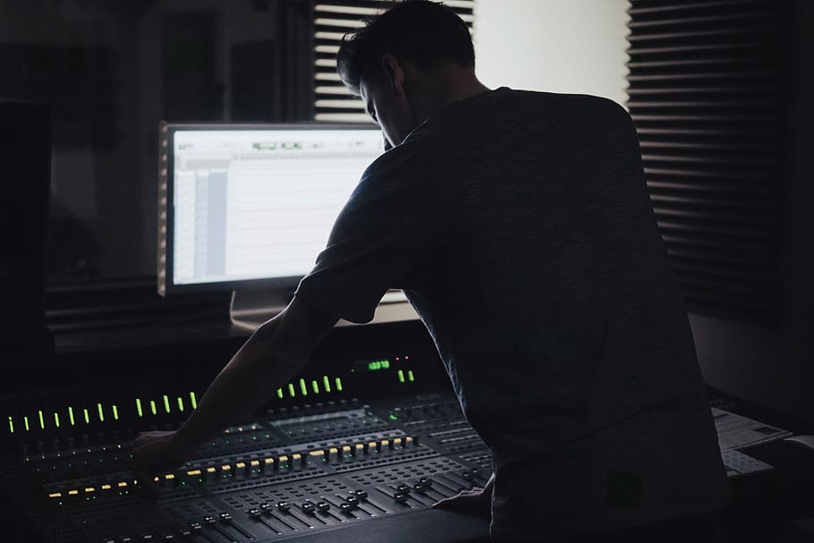 man operating audio mixer, man playing audio mixer in front of flat screen monitor turned on, HD wallpaper
