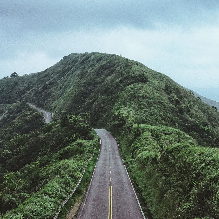 photo of road between mountain, empty concrete road along mountain HD wallpaper