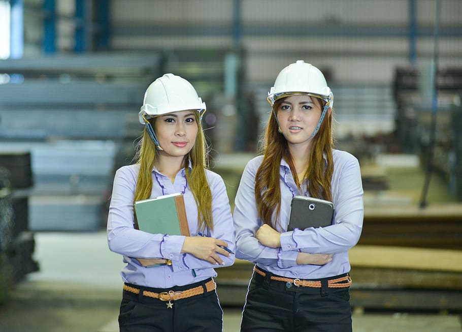 two women standing inside building, people, staff, construction HD wallpaper