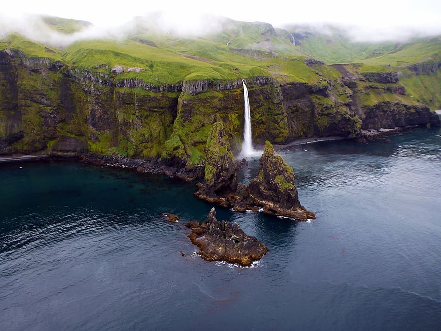 time lapse photography of waterfalls, aerial view, green, ocean