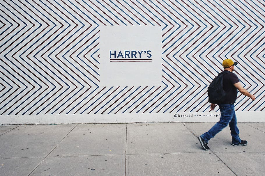 man walking, man walking on gray concrete road, pattern, wall HD wallpaper