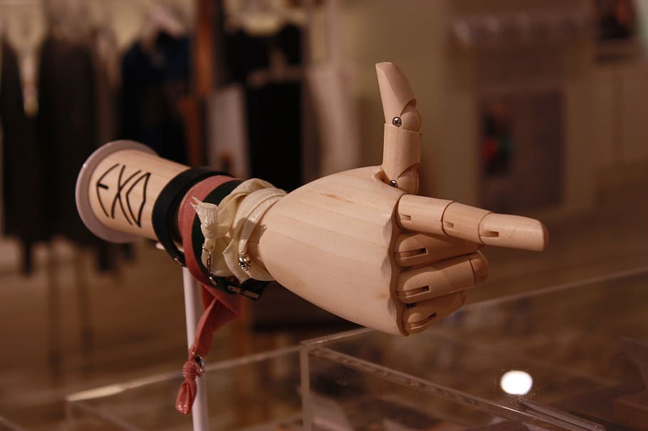 brown woden Exo hand robot model, k-pop, singer, korean, finger
