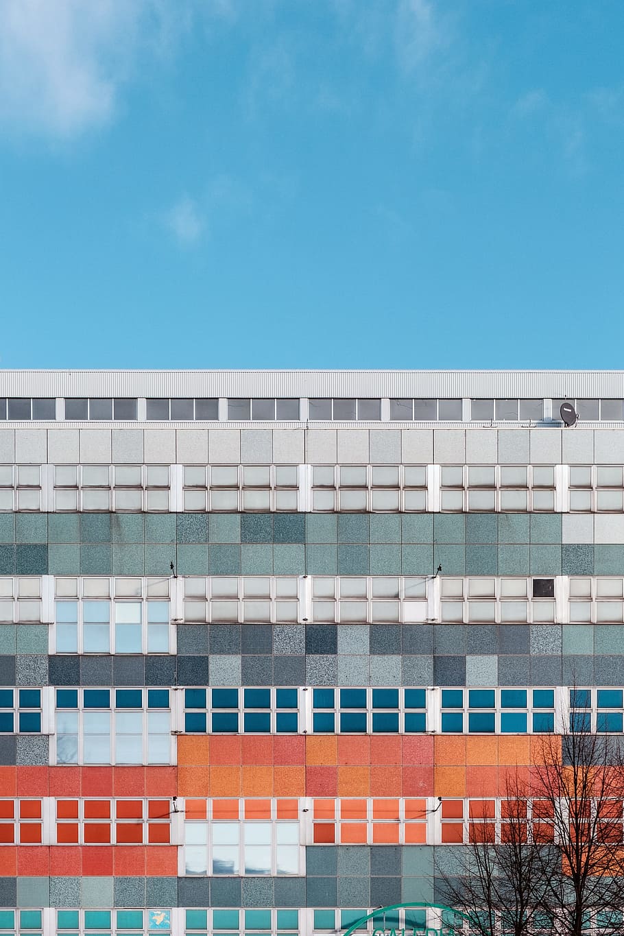 multicolored window building, multicolored concrete building during day HD wallpaper