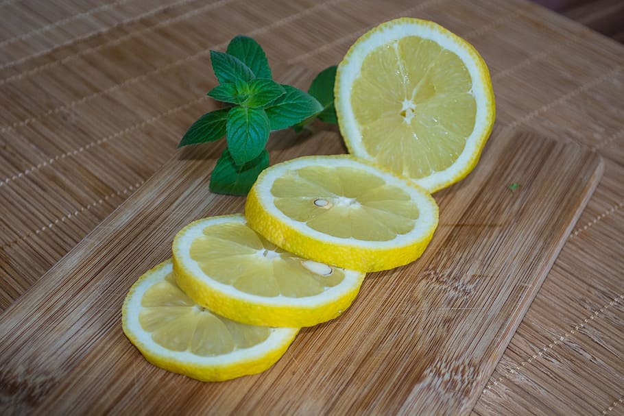 sliced lemon on chopping board, Lemons, Vitamins, summer, refreshment HD wallpaper