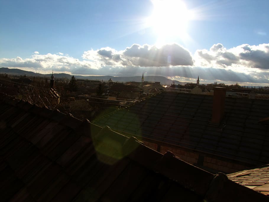 roofs, buildings, sky, blue, esztergom, clouds, rays of the sun