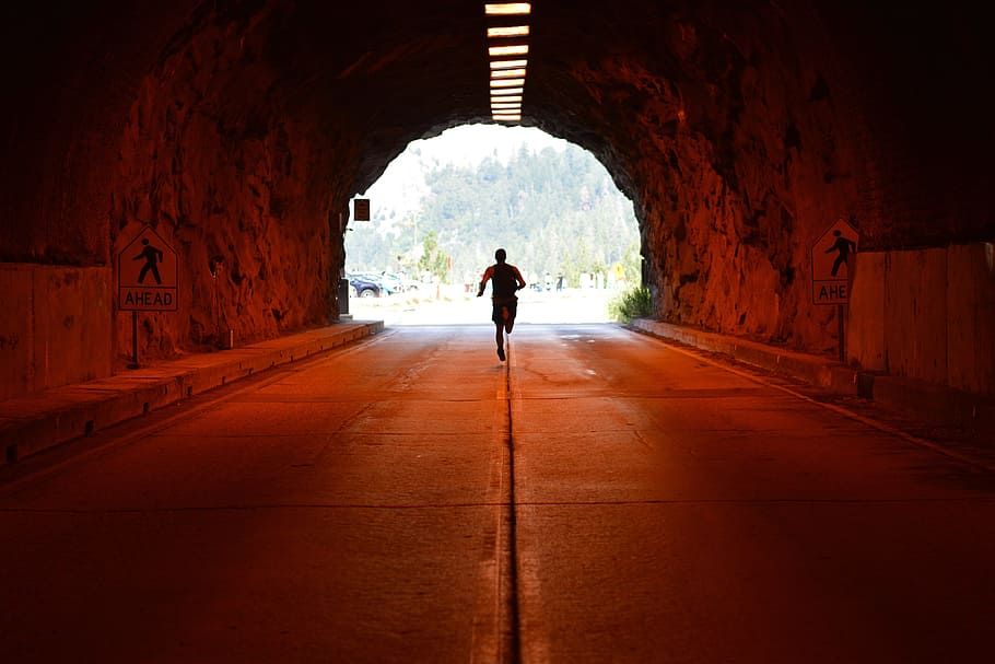 A man running/jogging in a tunnel, people, exercise, fitness, HD wallpaper