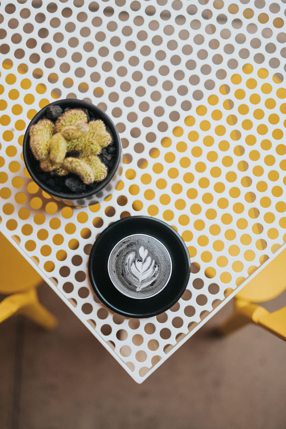 two round black ceramic containers, The Other Black Coffee, activated charcoal HD wallpaper