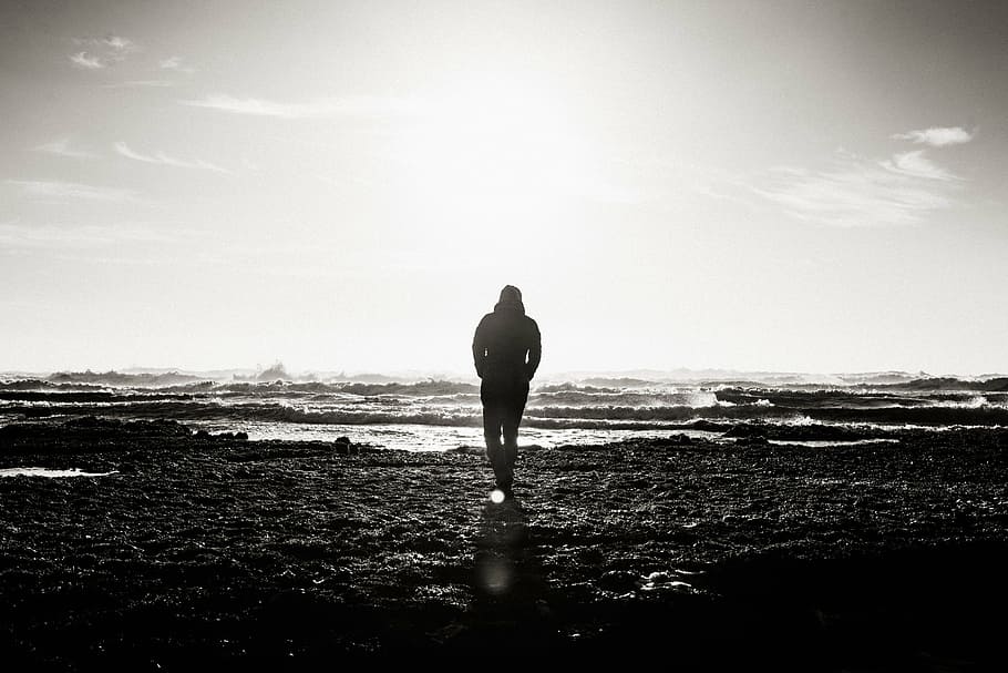 silhouette photographed of person, beach, black and white, daytime