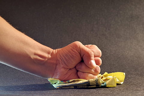left person's fist on yellow paper, anger, impotence, oppression HD wallpaper