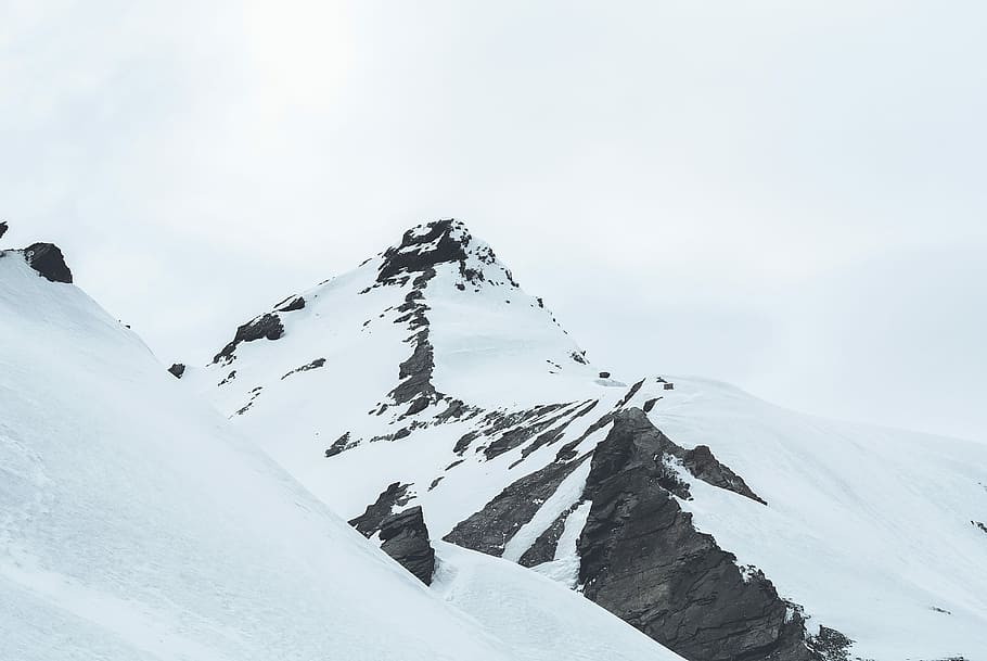 mountain peak covered with snow, glacier mountain under white clouds photo during daytime HD wallpaper
