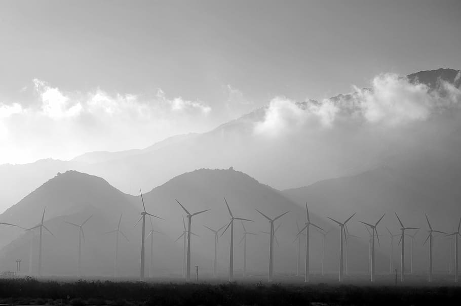 wind turbine near mountains, windmills near mountain under white sky HD wallpaper