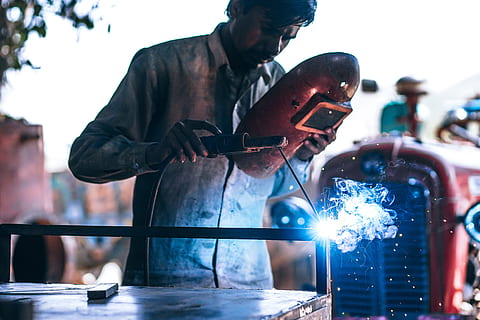 man doing welding holding red welding mask, people, arc, construction HD wallpaper
