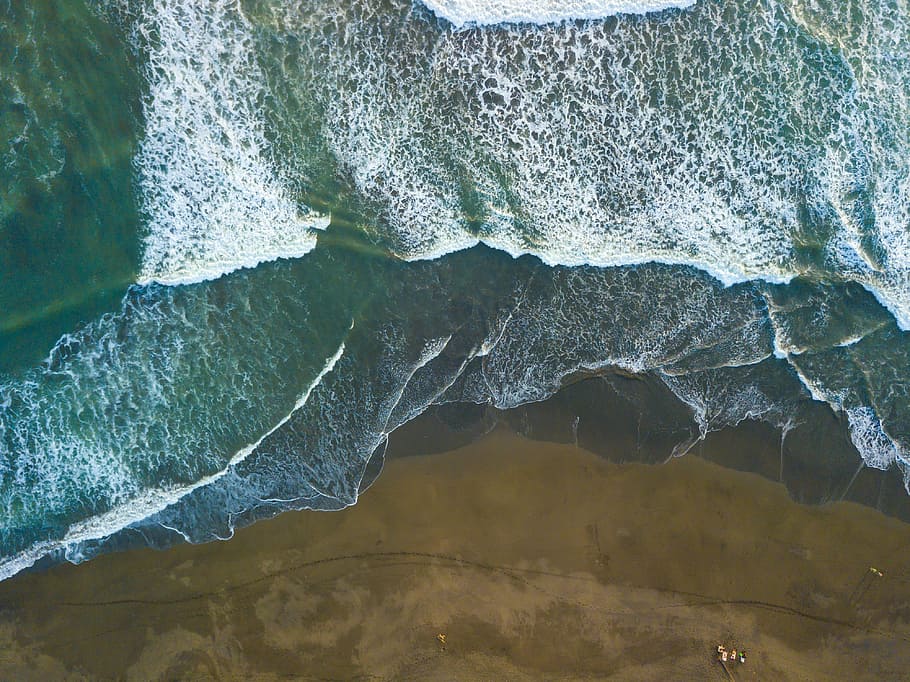 aerial view photography of body of water, waves of water on seashore HD wallpaper