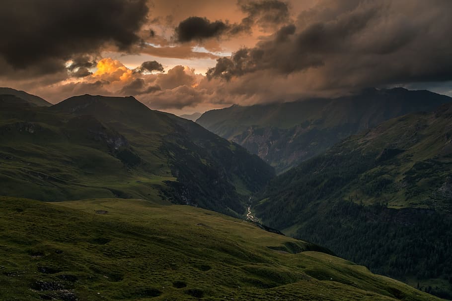 valley under cloudy sky, landscape photography of a mountain during golden hour HD wallpaper