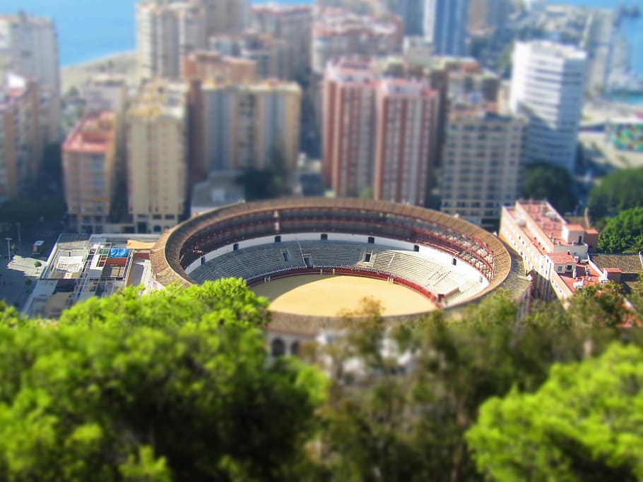 Bullring in Malaga, Spain, tilt shift photography of brown arena HD wallpaper