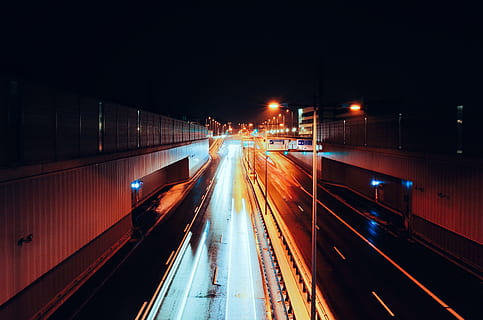 empty road with streaks of light during nighttime time lapse photography, aerial photography of asphalt road during nighttime HD wallpaper