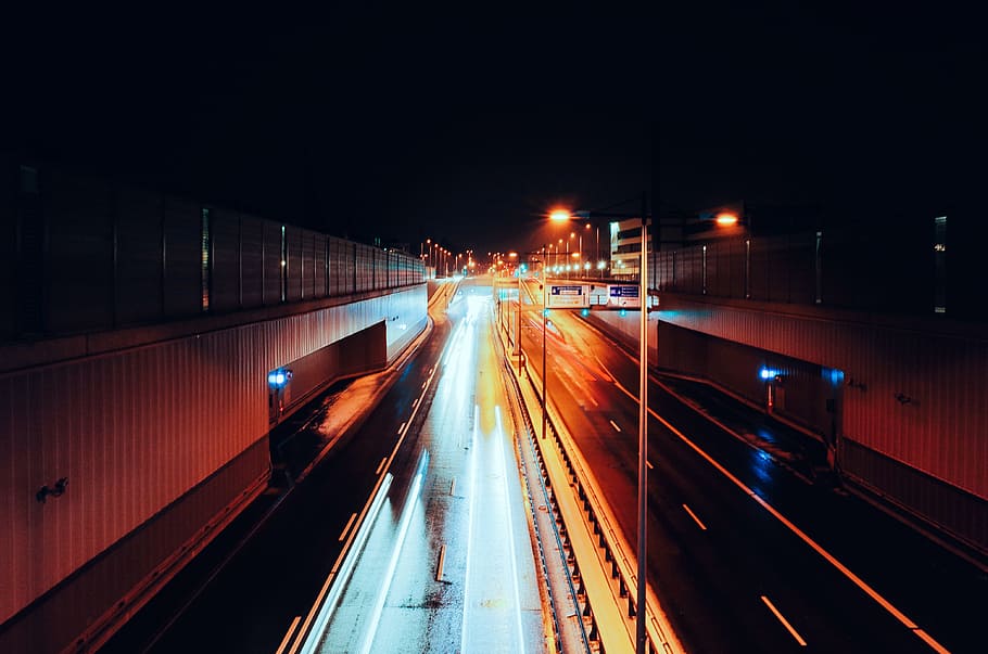 empty road with streaks of light during nighttime time lapse photography, aerial photography of asphalt road during nighttime HD wallpaper