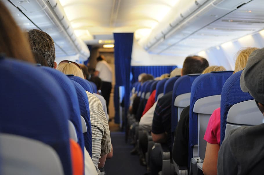 people sitting on plane seats, airplane, on board, travel, transportation