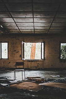 brown chair in abandoned house, open window on abandoned building HD wallpaper