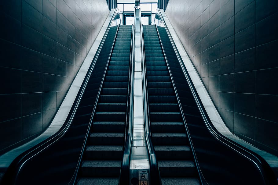 Synchronized, gray escalator, stairs, steps, wall, urban, architecture