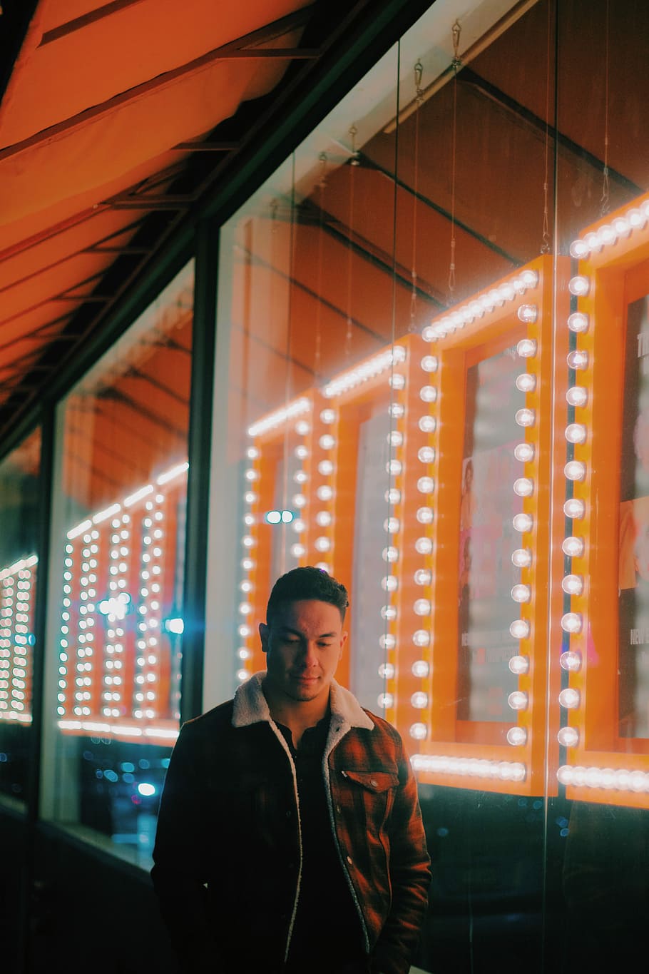 man standing near glass wall, one person, real people, illuminated HD wallpaper