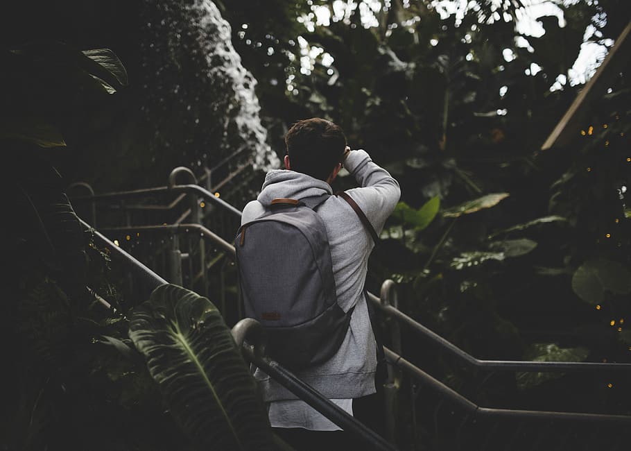 man wearing backpack, caucasian, stair, travel, real people HD wallpaper