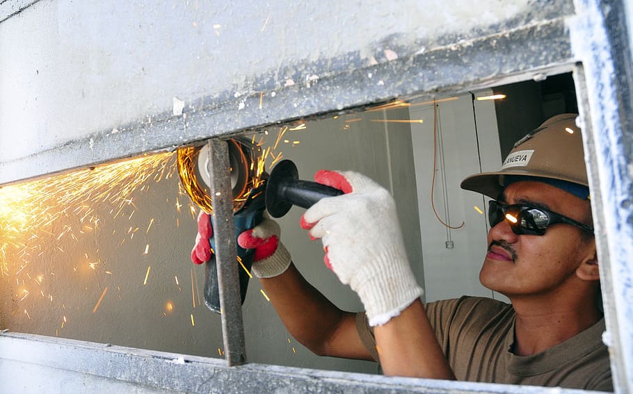 man using angle grinder, grinding, maintenance, labor, work HD wallpaper