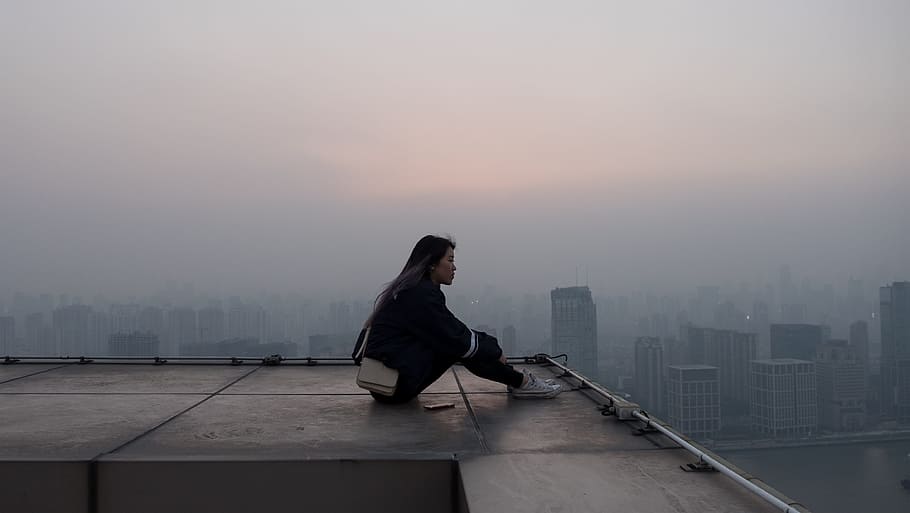 woman in black jacket and pants sitting on roof top, architecture HD wallpaper