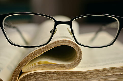 black frame eyeglasses on book page, bible, holy scripture HD wallpaper