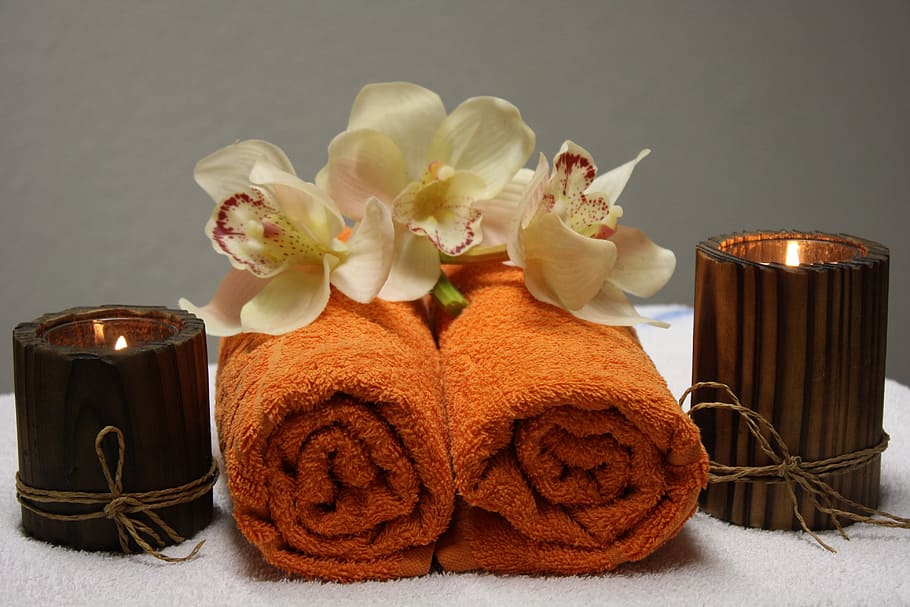 two orange towels beside brown votive candles, wellness, massage, HD wallpaper