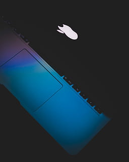 MacBook Pro on dim light, computer, glow, color, dark, apple HD wallpaper