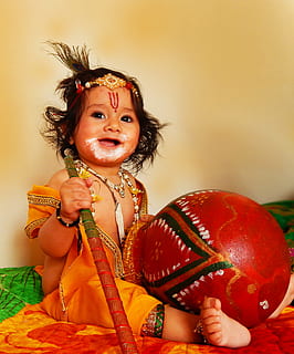 baby holding red and brown staff, lord krishna, hindu, one person HD wallpaper