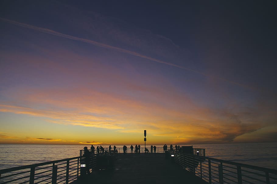 silhouette of people on dock, sunset, purple, yellow, sky, pier HD wallpaper