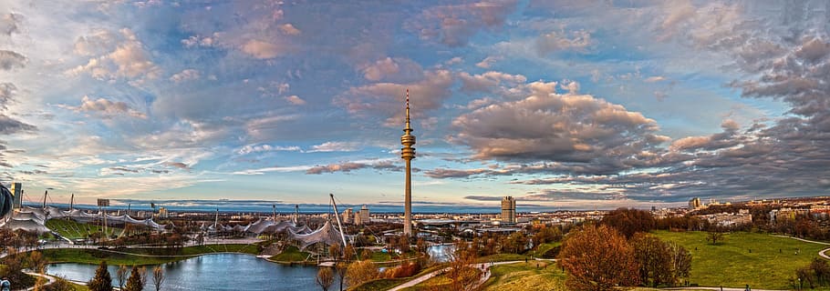 panoramic photo of a city during fall, munich, olympia mountain